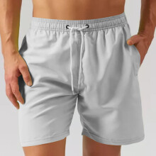 Sneldrogende sportshorts voor heren, ademend, effen kleur, meerdere opties, trekkoord, knielengte, losse pasvorm.
