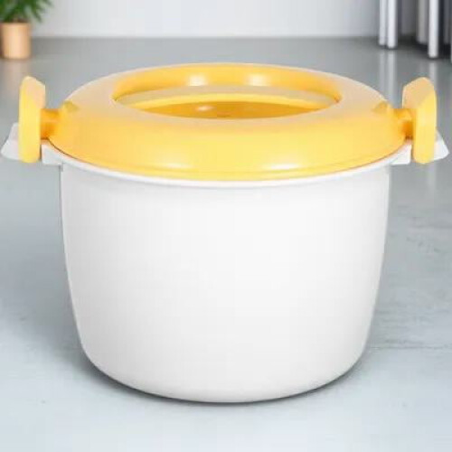 Draagbare magnetronrijstkoker met voedselcontainer van 1,2 liter.