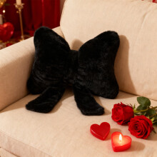 Coussin en forme de nœud noir 45 x 41 cm, fausse fourrure de lapin