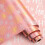 Roze kerstcadeaupapierrol, wit en goud 1