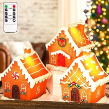 Decoración de casa de jengibre iluminada, funciona con pilas y tiene mando a distancia, con luces LED parpadeantes y efecto de cera real. Compatible