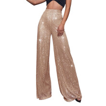 Calça feminina Mardi Gras, comprimento total, modelagem ampla, pernas largas, cintura alta e lantejoulas. Amarela, ideal para o fim de semana.