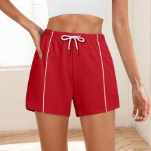 Shorts femininos lisos da moda com cintura elástica, cordão e bolsos laterais para uso casual.