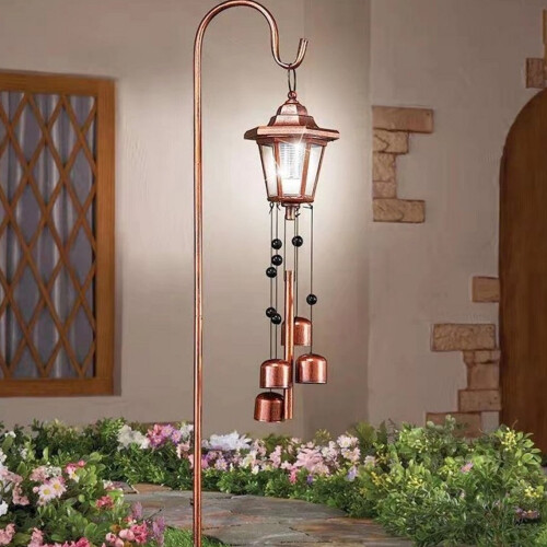 Carillon solaire hexagonal en bronze et fer, avec lumière éolienne.