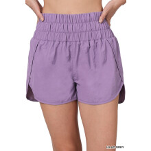 Shorts femininos casuais corta-vento com cós elástico para corrida e academia, com calcinha interna embutida.