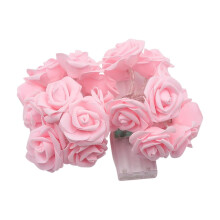 Guirlanda de luzes de rosas cor-de-rosa alimentada por USB com lâmpadas de luz branca quente.