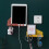 Supporto da parete per la ricarica di telefoni e tablet con 4 ganci 2