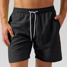 Sneldrogende sportshorts voor heren, ademend, effen kleur, meerdere opties, trekkoord, knielengte, losse pasvorm.