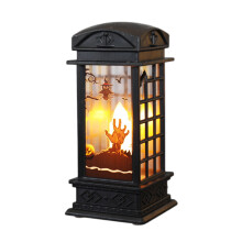 Lanterne LED compacte noire portable à piles avec poignée, idéale pour l'éclairage de table décoratif, en intérieur comme en extérieur.