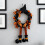 Ghirlanda di Halloween con gambe per la porta 4