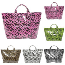 Waterdichte draagtas met luipaardprint voor dames, grote capaciteit, handtas met letterprint, transparante plastic hobo tas voor winkelen en reizen.
