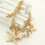 Bracciale da donna con conchiglie, stelle marine e perle finte. 3