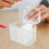 Scatola organizer trasparente in plastica per dischetti di cotone 3