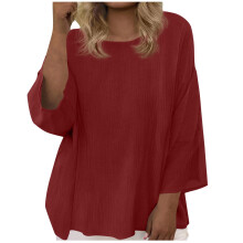 Blusa holgada de manga tres cuartos con cuello redondo, color liso, talla grande para mujer: una prenda informal, suave y cómoda para uso diario, en