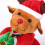 Muzikaal oplichtend kerstmanknuffel 33 cm 4