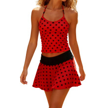 (L, Red) Completo estivo da donna: top senza maniche a pois e minigonna, perfetto per serate in discoteca.