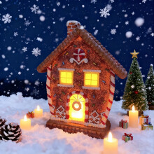 Kerstpeperkoekhuisje van hars met ledverlichting voor feestelijke huisdecoratie, handgemaakte tafeldecoratie voor een feestelijke sfeer.