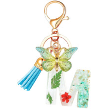 Chaveiro com borboleta verde e inicial M