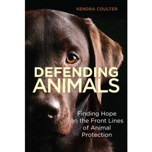 Defending Animals by Kendra Coulter Paperback Book
