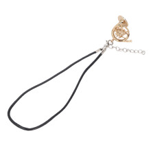 Collier modèle de trompette en or pour les amateurs de musique