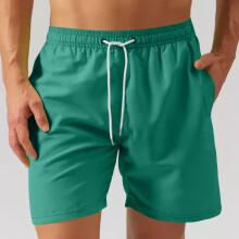 Sneldrogende sportshorts voor heren, ademend, effen kleur, meerdere opties, trekkoord, knielengte, losse pasvorm.