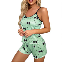 Pyjamassæt med sløjfe og polkaprikker til kvinder. Ærmeløs camisole og shorts i mælkesilke (S-XL). Blød og elastisk.