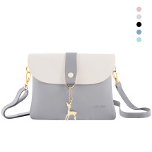 Dievčenská crossbody kabelka z umelej kože s krásnym príveskom s jeleňom, ružová