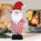 Beleuchtete Weihnachtsmann-Plüschpuppe als Dekoration 1