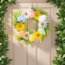 Ghirlanda di uova di Pasqua e carote per la porta d'ingresso