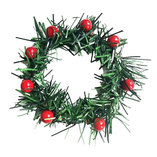 Julservettringar med röda bär och tallblåtar