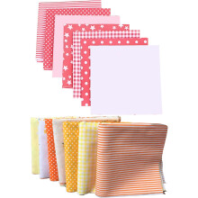 14 katoenen stofvierkanten van 50x50 cm, rood en oranje.