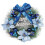 Christmas pine wreath with blue bow and ornaments 1