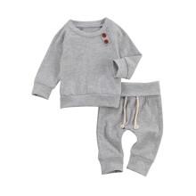 Completo pigiama per neonato composto da top in maglia e pantaloni con lacci (2 pezzi)