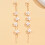 Boucles d'oreilles longues blanches à fleurs et petit pompon 4
