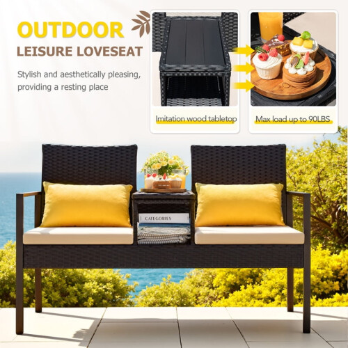 Divano a due posti da esterno in rattan con cuscini e tavolino, colore beige. 2