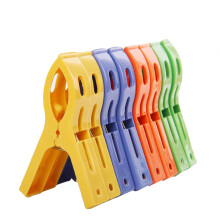 8Pcs Non-Slip Plastic Clothes Clips for Towels, Sheets, Quilts – Heavy-Duty Spring Clamps (Yellow), compatible with standard drying lines