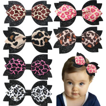 6 stuks 4,1 inch haarstrikjes met luipaardprint, glitteraccenten en diverse kleuren.