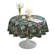 Nappe ronde AUQ en lin et coton doux, motif feuille. Simple et élégante, elle est idéale pour les tables basses et les salles à manger.