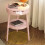 Pink bedside table with drawer and shelf, compact 1