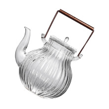 Tetera de vidrio resistente al calor con diseño de pétalos de crisantemo, 800 ml, mango de cobre, compatible con cocinas eléctricas de cerámica.