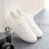 Baskets basses blanches en cuir synthétique pour femmes 2