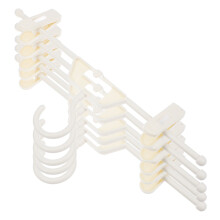 Lot de 5 cintres Ă pinces pour pantalons et jupes, gain de place, beige et blanc.