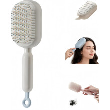 Retractable Cushion Massage Comb White 1pc