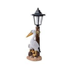 Estatua de pelícano para jardín con linterna solar. Luz solar de pelícano para decoración exterior. Esculturas y estatuas. Luces para decoración