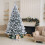 7ft white snow-flocked Christmas tree with 800 tips and 3