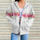 Felpa da donna leggera con zip intera, vestibilità oversize e tasche. 2