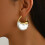 Elegante statement oorbellen met parelinleg 5