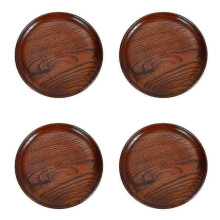 Gladde houten broodplaten en schaaltjes voor kruiden en specerijen.