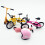Set di biciclette e scooter in miniatura con casco - Rosa 14
