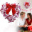 Ghirlanda floreale a forma di cuore con fiocco rosso 1